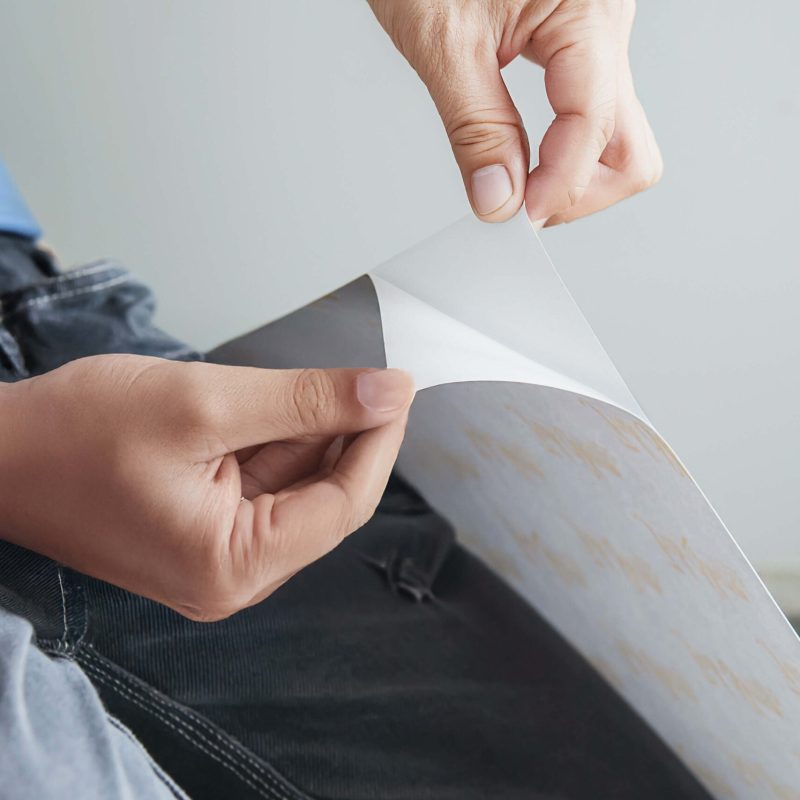Midsection person holding paper